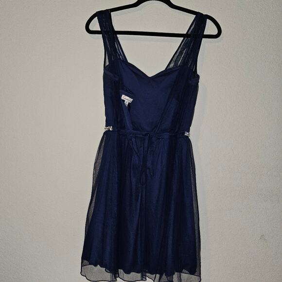 dark blue midi dress with a shiny waist-line and faded shine on shoulders - Picture 2 of 11